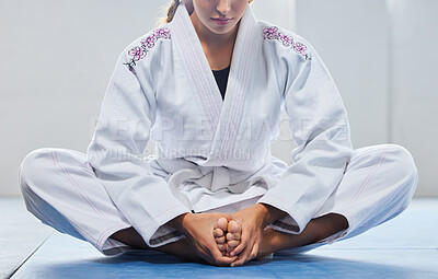 Buy stock photo Warm up, legs and woman in karate training, learning martial arts and focus before a fight. Fitness, performance and feet of girl in taekwondo class for body power, self defense and start of exercise