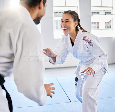 Buy stock photo Karate, fitness and teacher with student, combat sports and training for skill development, power and discipline in dojo gym. Fight, happy in taekwondo class and martial arts with sport exercise.