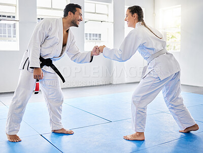 Buy stock photo Fist bump, support and couple in karate, training and teaching in partnership for motivation in self defense. Goal, fight and man and woman with unity in taekwondo for exercise and fitness at a club