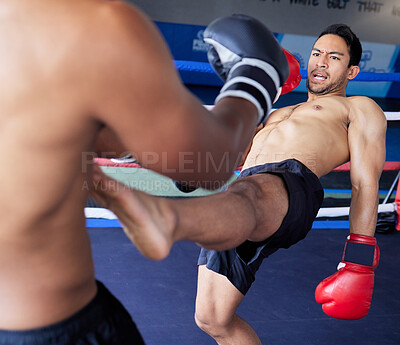 Buy stock photo Boxer, fight and sports competition with men in boxing ring for exercise, workout and martial arts workout at a fitness club. Athlete man in action with a kick for combat sport at a gym for health