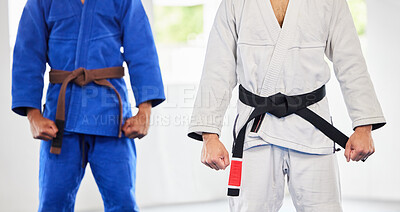 Buy stock photo Karate, dojo and men in uniform for training, exercise or a fight competition, tournament or championship. MMA, martial arts and fighter athletes in a gi suit for a workout or practice in a gym.