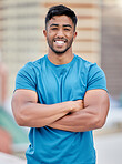 Fitness, exercise and portrait of a sports man standing arms crossed outdoor with a smile on his face. Workout, health and happy with a male athlete training outside for cardio or strong muscles