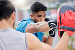 Boxing, fitness and athlete with personal trainer, men together, fight training for exercise and boxer gloves. Combat sport, defense and skill development with workout outdoor, health and cardio.