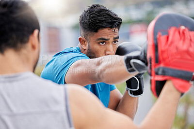 Boxing, fitness and athlete with personal trainer, men together, fight training for exercise and boxer gloves. Combat sport, defense and skill development with workout outdoor, health and cardio.