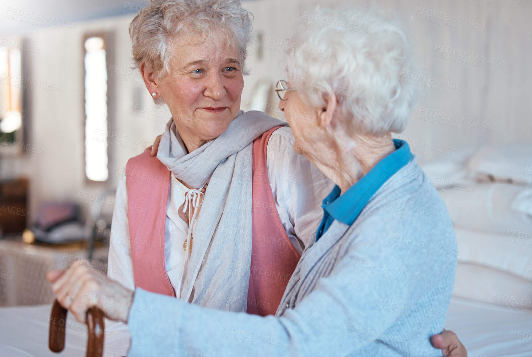 Buy stock photo Happy, friends and senior women talking and bonding in a bedroom together of a retirement home. Happiness, conversation and retired elderly female best friends with a smile speaking of gossip in room