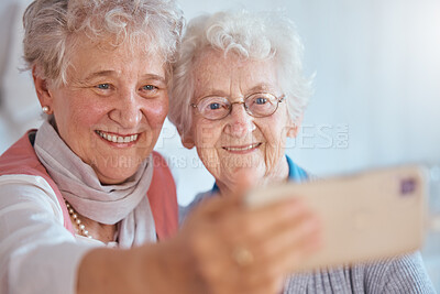 Buy stock photo Phone selfie, elderly women and friends smile for comic photography in retirement home together. Happy, senior woman and 5g internet app for quality time memory, laughing and friendship on smartphone