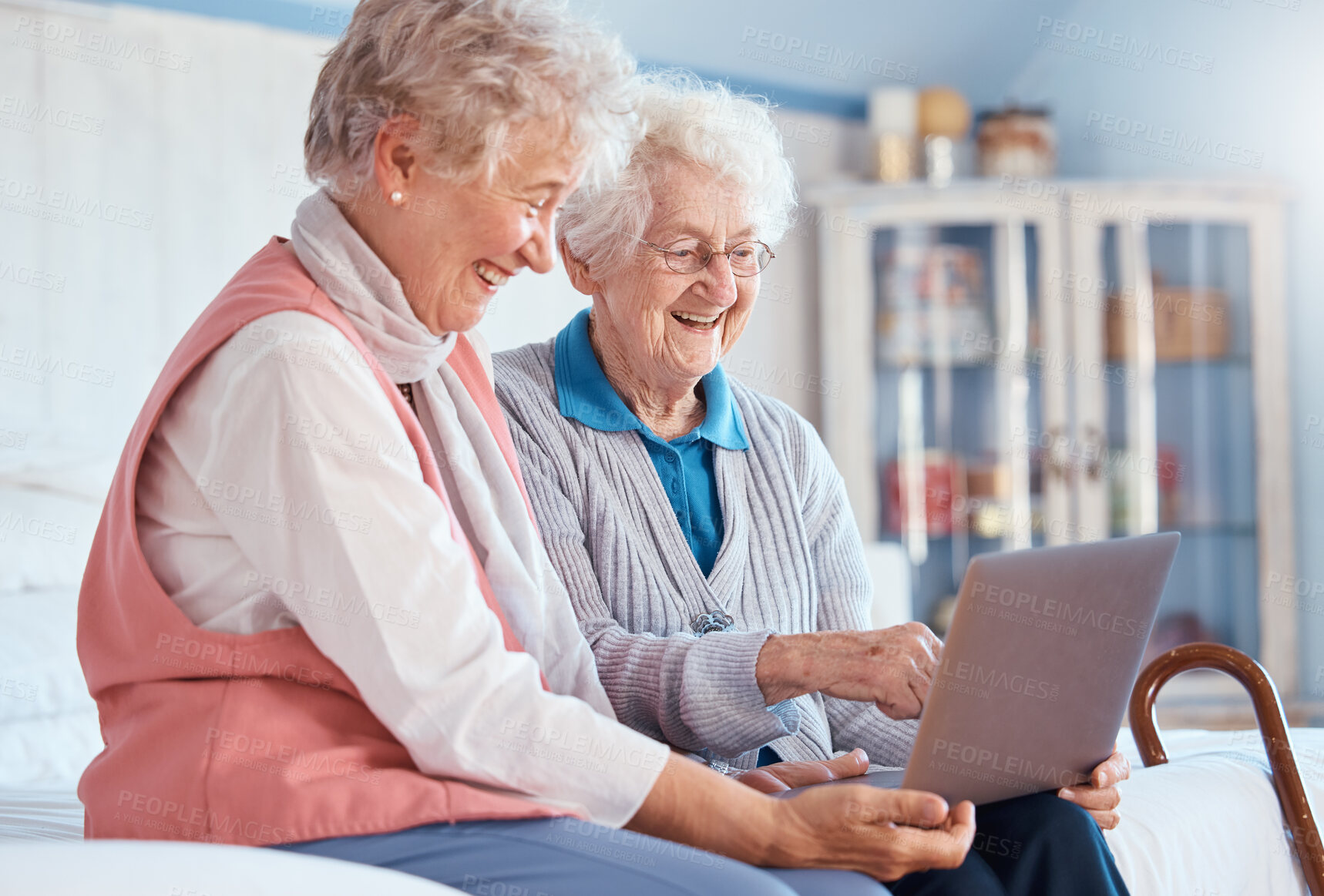 Buy stock photo Senior women, friends and laptop in home for social media, watching movie or video call. Tech, computer and happy elderly retired females streaming video or internet browsing while talking together.