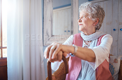 Buy stock photo Senior woman, cane and thinking in home, nostalgic or contemplating old memory. Disability, support and retired female with walking stick relaxing, focus or lost in thoughts alone in lonely house.