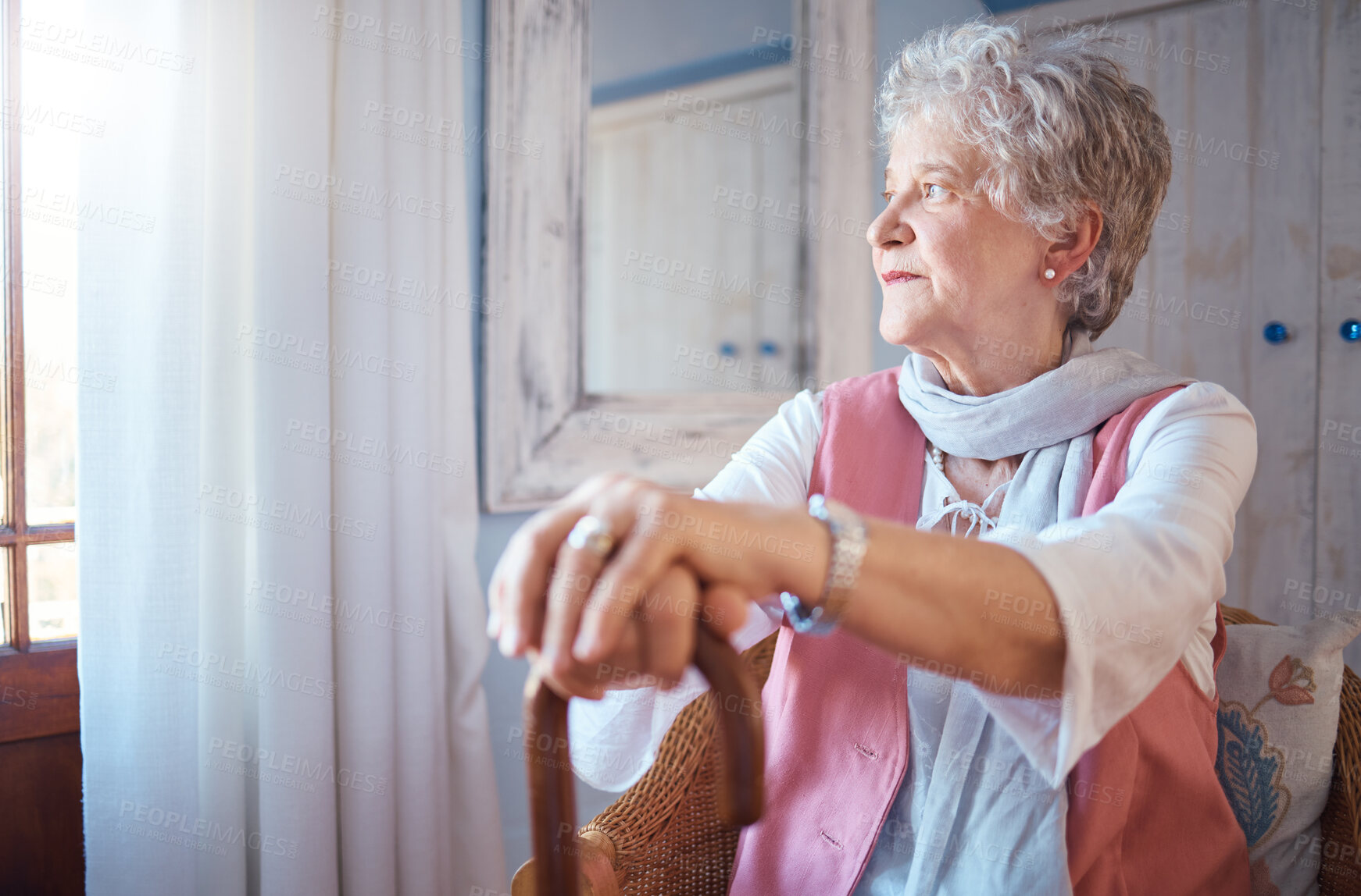 Buy stock photo Senior woman, cane and thinking in home, nostalgic or contemplating old memory. Disability, support and retired female with walking stick relaxing, focus or lost in thoughts alone in lonely house.