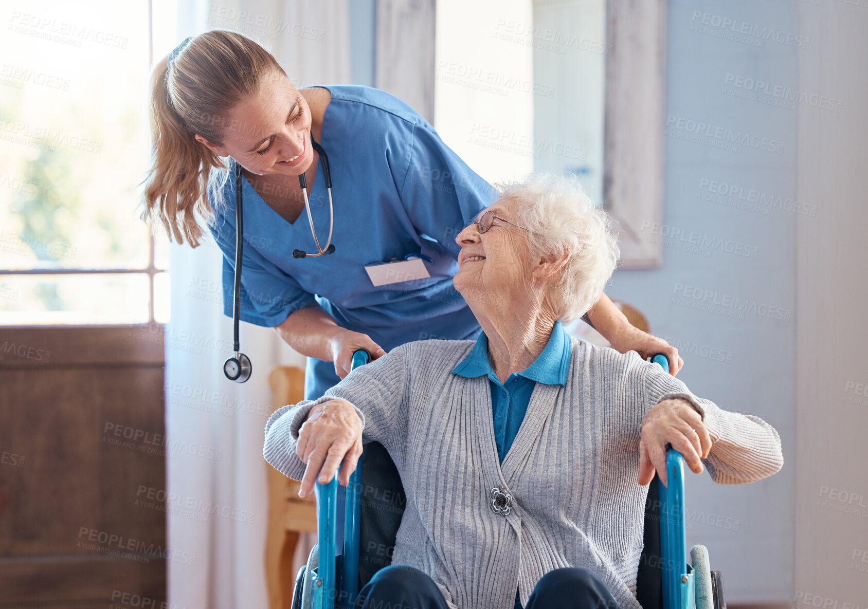 Buy stock photo Nurse, home and elderly woman with a disability in a wheelchair in medical nursing facility. Happy, healthcare and doctor helping and talking to disabled senior lady in retirement house in Australia.