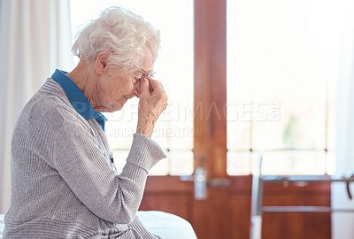 Buy stock photo Senior woman, headache and stress with anxiety in retirement house, lonely and sad with mental health. Elderly female, depression and frustrated with fear for health, fail and mad with grief problem