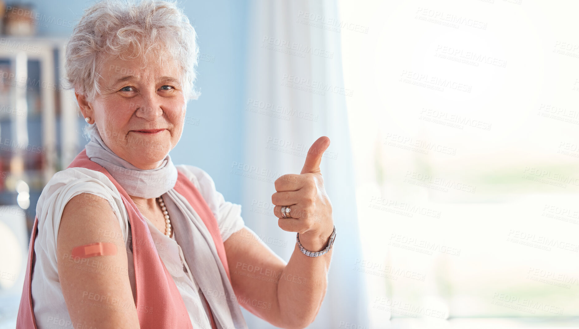 Buy stock photo Senior woman, vaccine and covid with thumbs up in portrait, hospital and smile with plaster. Happy elderly lady, vaccination and yes hand for safety, healthcare or medical protection against covid 19