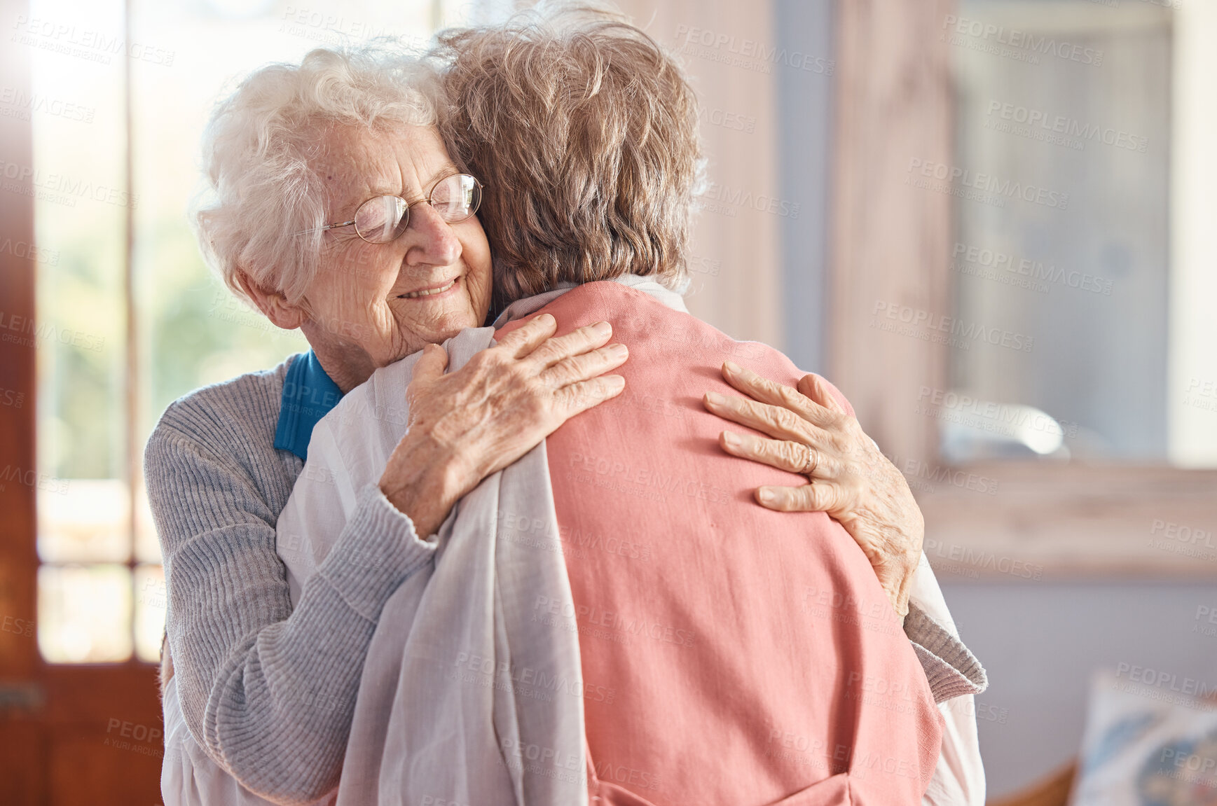 Buy stock photo Friends, comfort and senior women hug in nursing home for empathy, compassion and care. Love, support and elderly female best friends hugging, embrace and bonding to enjoy happy retirement together