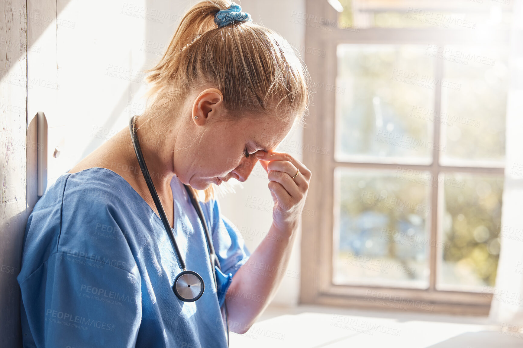 Buy stock photo Headache, stress and burnout of woman doctor, sad worker and medical employee. Frustrated, depression and tired nurse in hospital, mental health challenge and anxiety, pain and emotion of bad news 