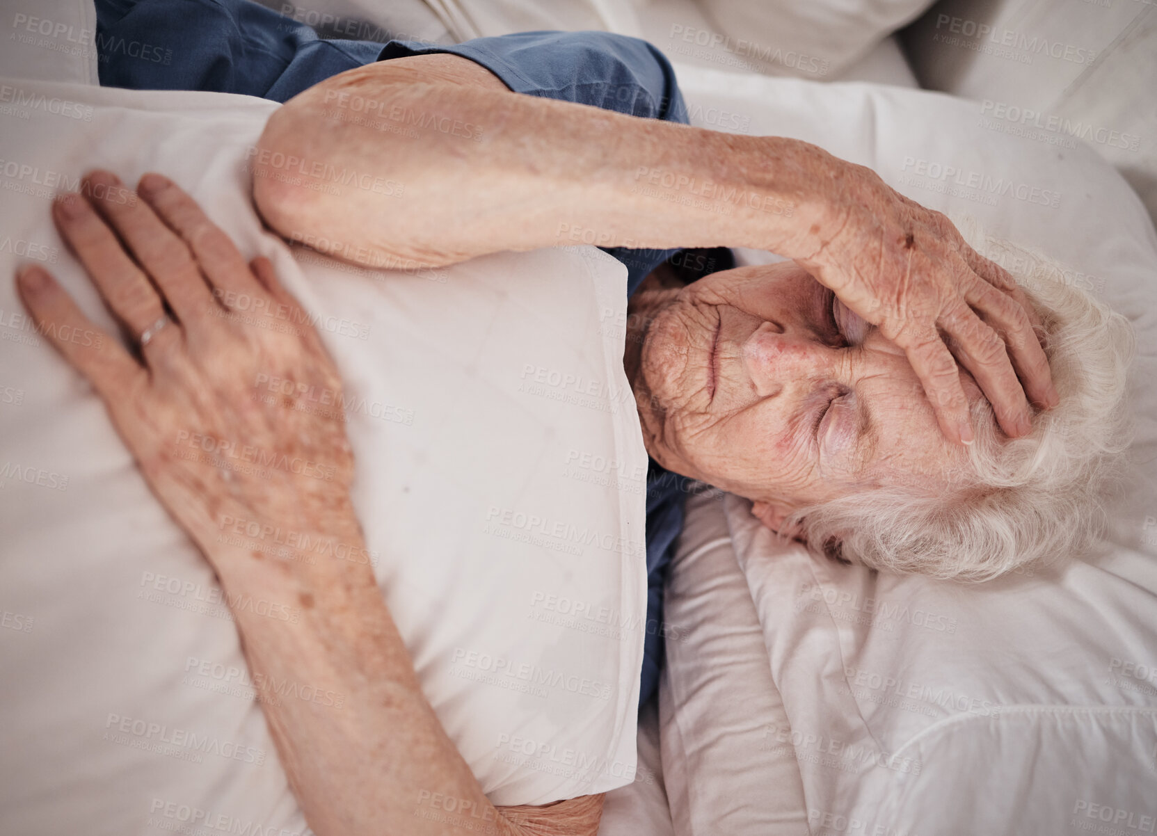 Buy stock photo Headache, pain and senior woman in bed for trauma recovery, rehabilitation or rest in elderly care nursing home. Healthcare problem, medical emergency crisis and retirement patient with brain cancer 