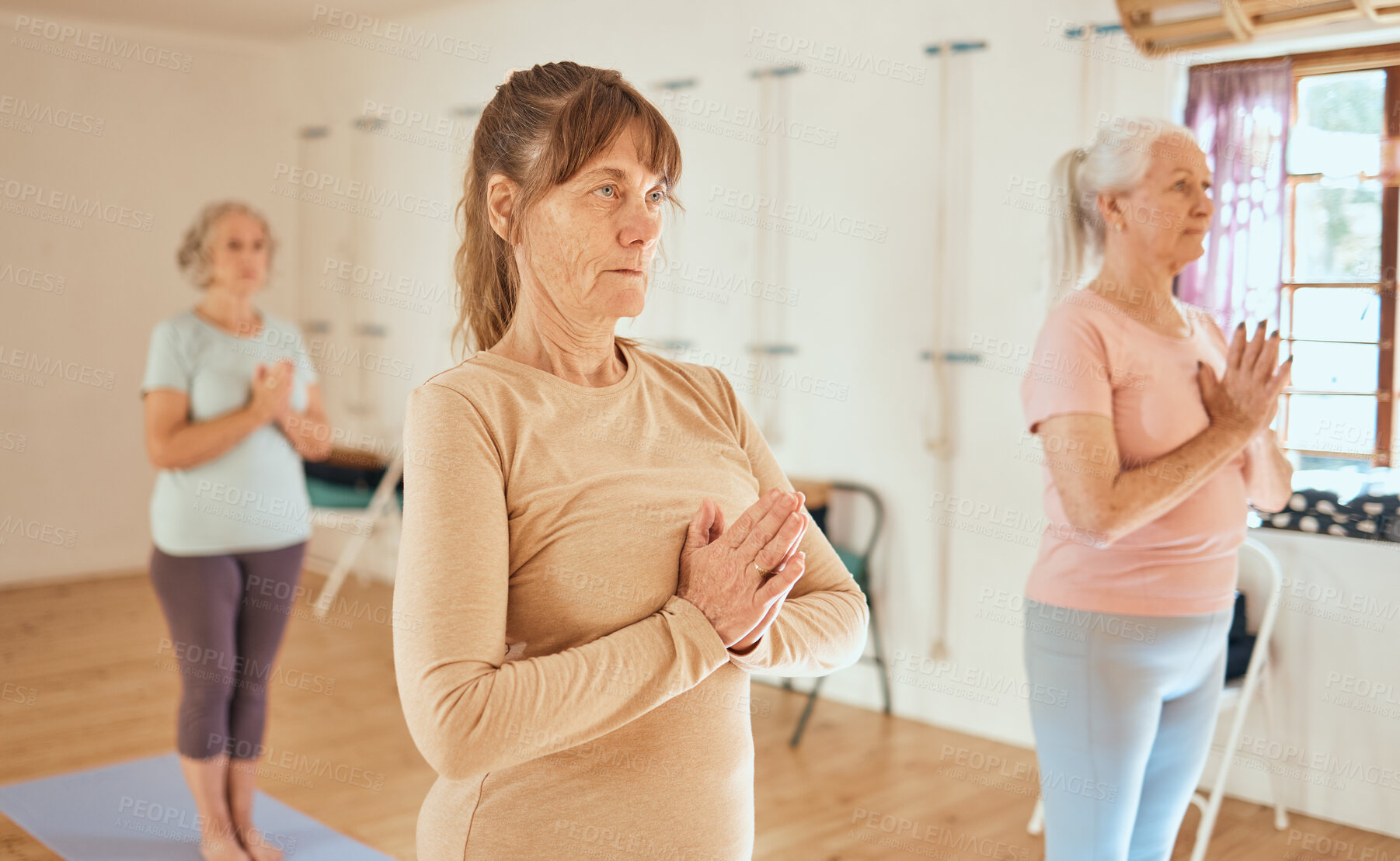 Buy stock photo Yoga, relax and retirement wellness class for health, mindfulness and spirituality lesson. Namaste, zen and calm senior women focus together in wellbeing club for a healthy mind and body.