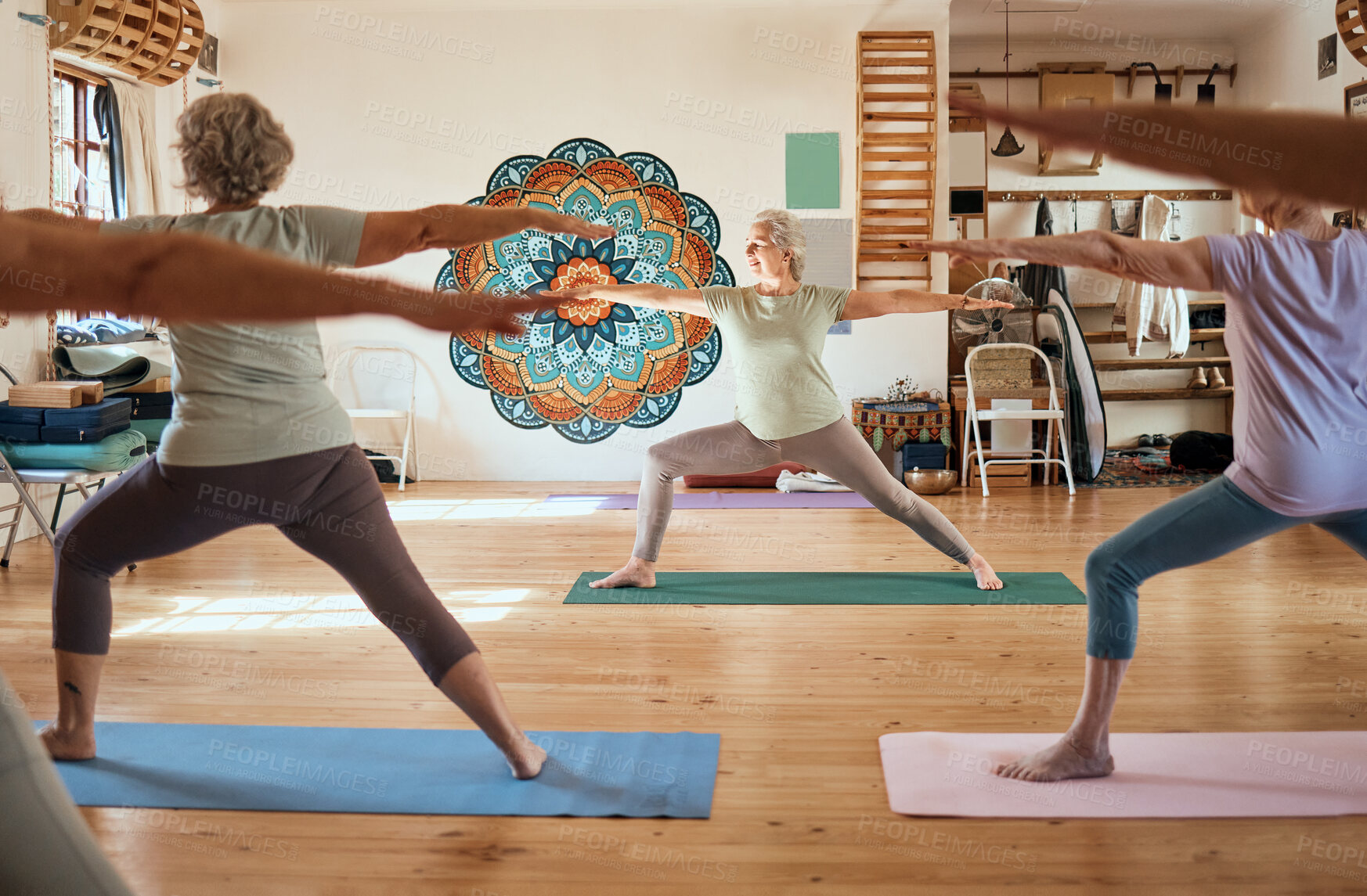 Buy stock photo Senior women, meditation and yoga class in a fitness studio while training a group of calm, relaxed and focused ladies. Stretching, mindful exercises and peaceful and healthy lifestyle or stretching