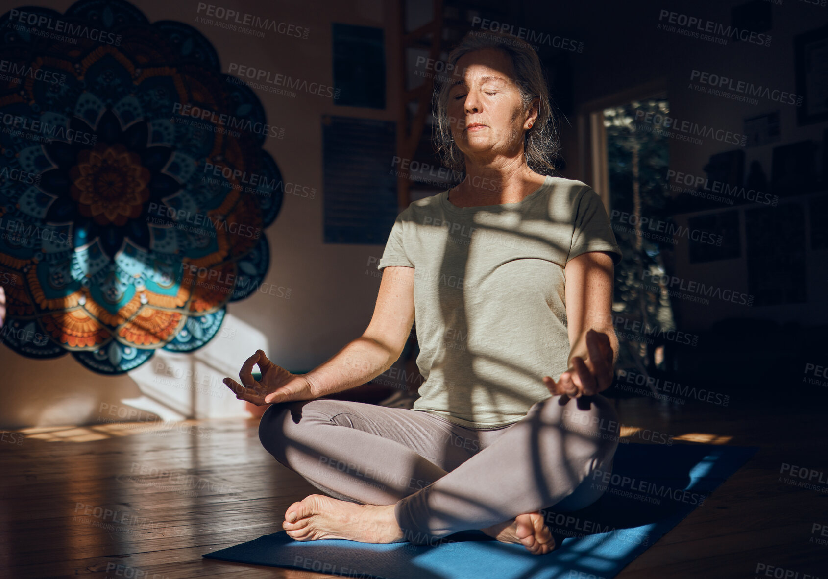 Buy stock photo Yoga, prayer hands and meditation of senior woman in dark house for spiritual wellness alone. Chakra energy, zen or mature female training in home to relax with eyes closed for mindfulness or peace.