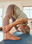 Yoga, flexibility and senior woman on a floor for dolphin pose, wellness and exercise in a living room. Pilates, elderly lady and flexible headstand on the ground for training, balance and spine 