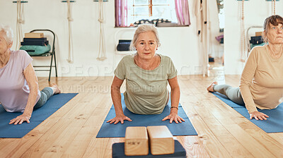 Buy stock photo Pilates, studio and senior friends doing a stretching exercise for health, wellness and fitness. Meditation, zen and elderly women doing a yoga workout for mind, body and spiritual balance in class.