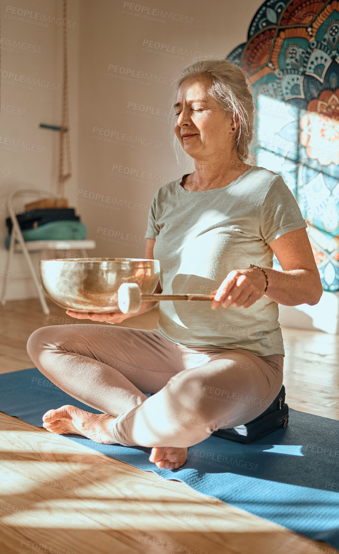 Buy stock photo Meditation, elderly woman and mindfulness, zen and yoga in fitness studio with tibetan singing bowl, balance and peace. Wellness, spiritual and wellness ritual for calm and harmony with buddhism.