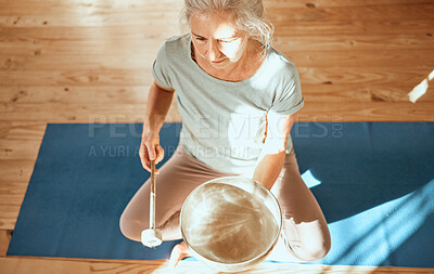 Buy stock photo Sound healing, bowl and senior yoga woman practice alternative medicine for aura, soul or chakra energy balance. Audio holistic healthcare, music therapy and top view of yogi with singing bowl 