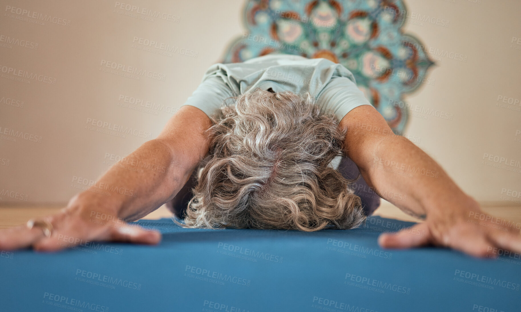 Buy stock photo Senior woman, yoga stretching and floor in gym exercise, workout or fitness training routine. Elderly yogi, studio and balance for wellness, health or zen mindfulness for healthy spiritual mindset