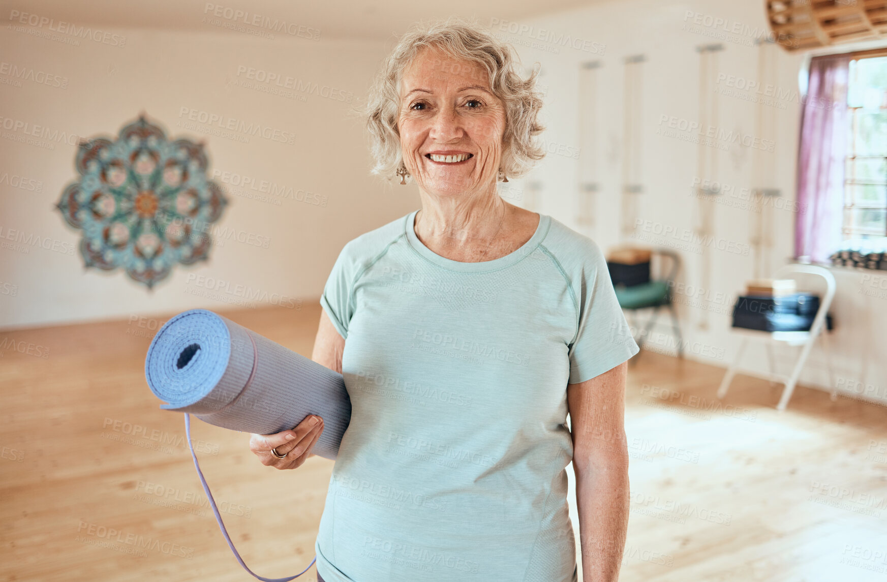 Buy stock photo Portrait, elderly woman and mat for yoga, fitness and exercise at studio, happy and relax for cardio wellness. Smile, active senior and lady instructor in training room for mediation, peace and zen  