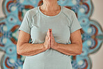 Yoga, meditation and praying senior hands or woman in creative zen studio for spiritual, wellness and healing zoom. Peace, calm and prayer hand sign person meditate for faith, care and soul healing