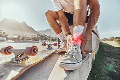Buy stock photo Skateboard man, injury and ankle pain, legs and outdoor accident, emergency or first aid risk with red glow at skatepark. Joint pain, bone health and wound fracture of skateboarder in sports accident