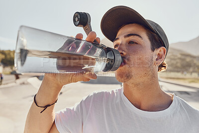 Buy stock photo Man, water bottle and outdoor closeup for hydration, fitness and workout in summer sunshine. Guy, drinking and water for exercise, training and wellness on break, relax or rest in urban park in sun