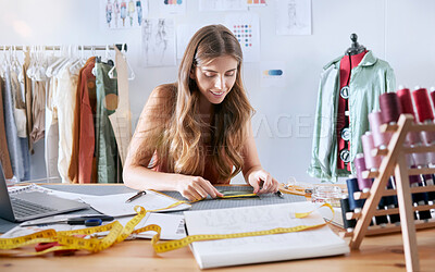 Buy stock photo Fashion, designer and creative with woman planning on fabric for manufacturing, retail and tailor in workshop studio. Pattern, textile and clothes with girl and tape for sewing, factory and boutique