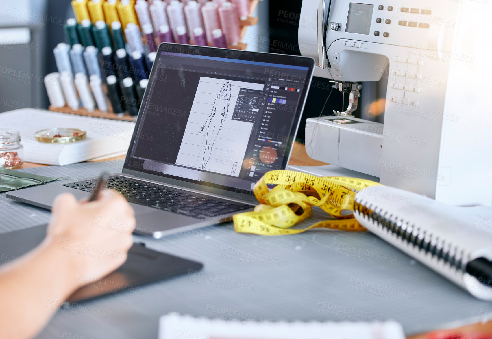 Buy stock photo Fashion, designer and laptop for a sketch or drawing for clothes manufacturing in a tailor workshop or factory for creative ideas. Hand of woman at desk with design technology for illustration work