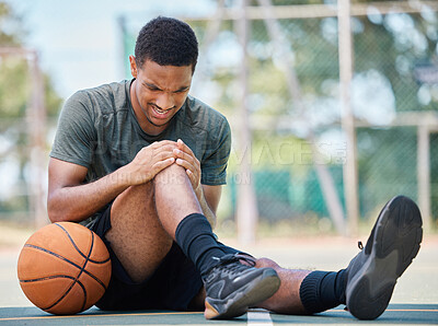 Buy stock photo Basketball court, man and injury, knee pain and joint pain, fitness emergency and first aid accident, risk and bone health. Black man, basketball player and leg pain, muscle inflammation and problem 