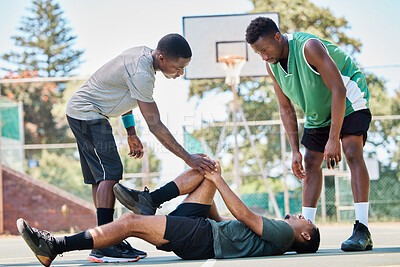 Buy stock photo Basketball, knee injury and sport accident with team help and support in a sports competition. Fitness, workout and basketball court emergency in a exercise game with athlete on the ground in pain