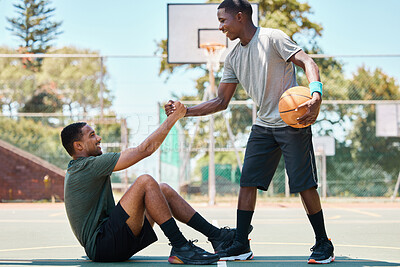 Buy stock photo Basketball, sports and teamwork, helping hand and support, respect and assistance in competition training games. Happy basketball player holding hands with friend, trust and kindness on outdoor court