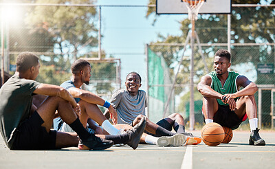 Buy stock photo Basketball court, men and friends talking about game, sports and training motivation after exercise, workout or competition. Black man with street ball team at community playground planning strategy