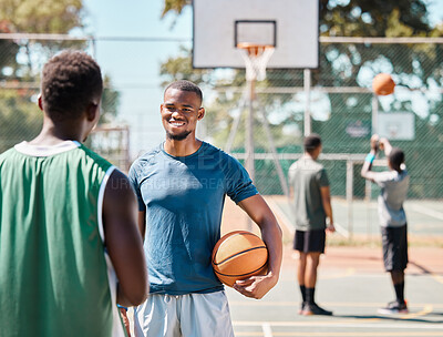 Buy stock photo Basketball, sports and talking with black man friends on a court before a competitive game together. Fitness, team and exercise with a male basketball player and friend chatting before sport training