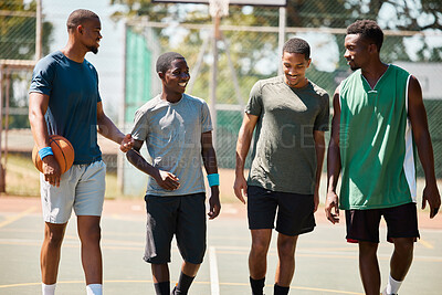 Buy stock photo Team walking, basketball and conversation on sports court for fitness, healthy exercise workout and wellness training. Teamwork motivation, relax collaboration and group of people on basketball court