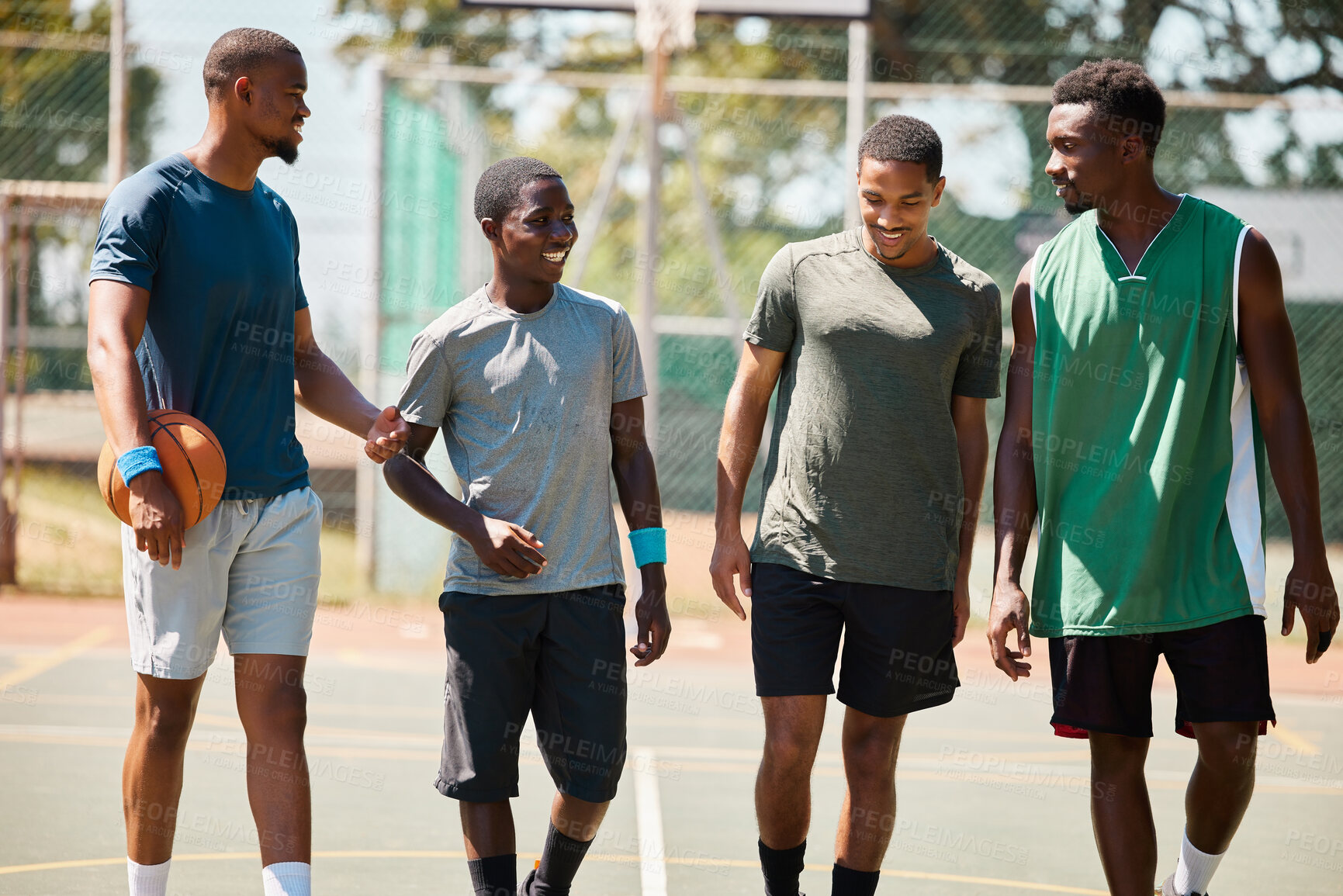 Buy stock photo Team walking, basketball and conversation on sports court for fitness, healthy exercise workout and wellness training. Teamwork motivation, relax collaboration and group of people on basketball court