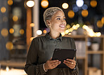 Night, tablet and business black woman in digital marketing for innovation planning, online strategy and internet research in bokeh office. Happy global manager with analytics report for tech company