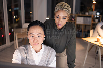 Buy stock photo Teamwork, night and women working on computer doing project, task and research in corporate office. Collaboration, technology and businesswomen work together on strategy, planning and report in dark