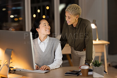 Buy stock photo Night, computer and collaboration with business women in office for digital marketing, project management and teamwork. Networking, idea and planning with employee for review, advertising or research
