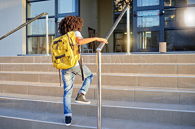 Buy stock photo Education, back to school and student in the morning ready to start learning and studying at school. Child with backpack walking on academy steps going to class for study and academic lifestyle