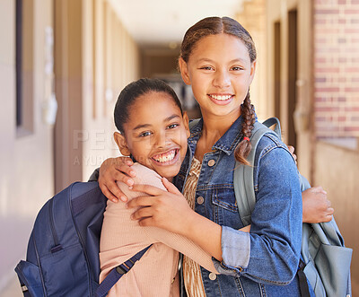 Buy stock photo School, friends and portrait of children hugging in hallway excited for class, learning and lesson in primary school. Education, friendship and young girl students embrace, smile and happy together