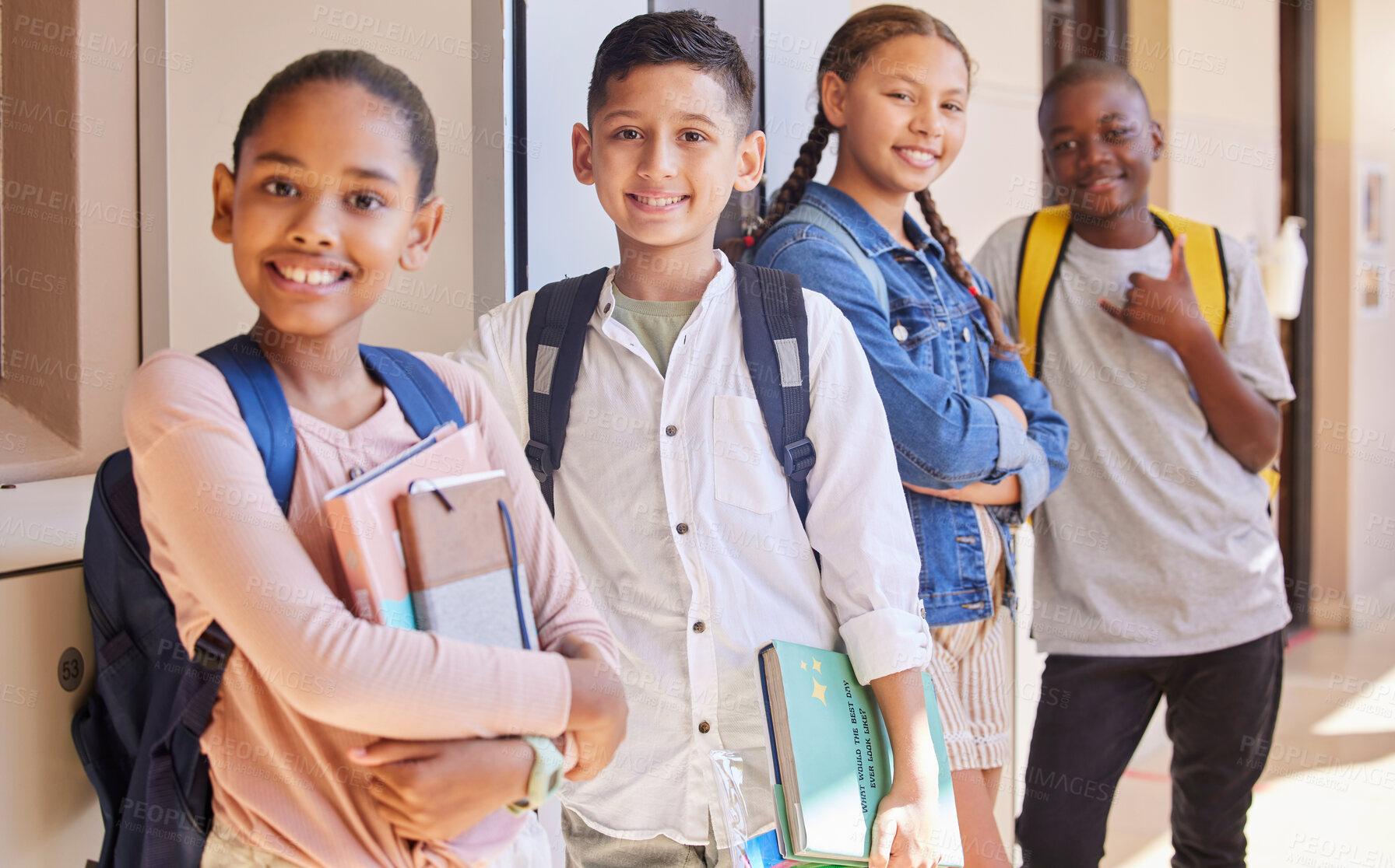 Buy stock photo School, friendship and portrait of a group of children standing with backpack and books in hallway. Education, diversity and knowledge, happy young students smile together outside classroom in USA.