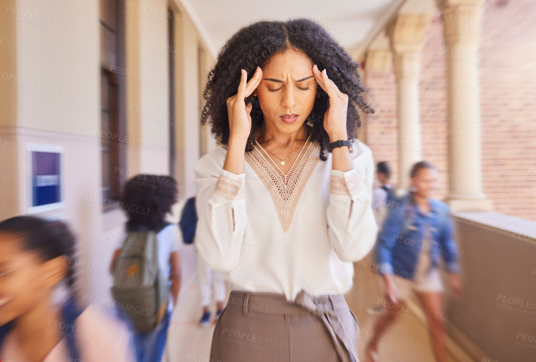 Buy stock photo Headache, tired and stress teacher in school with fast children thinking of work stress, education mindset and management challenge in hall. Black woman sad, angry and pain with speed or busy campus