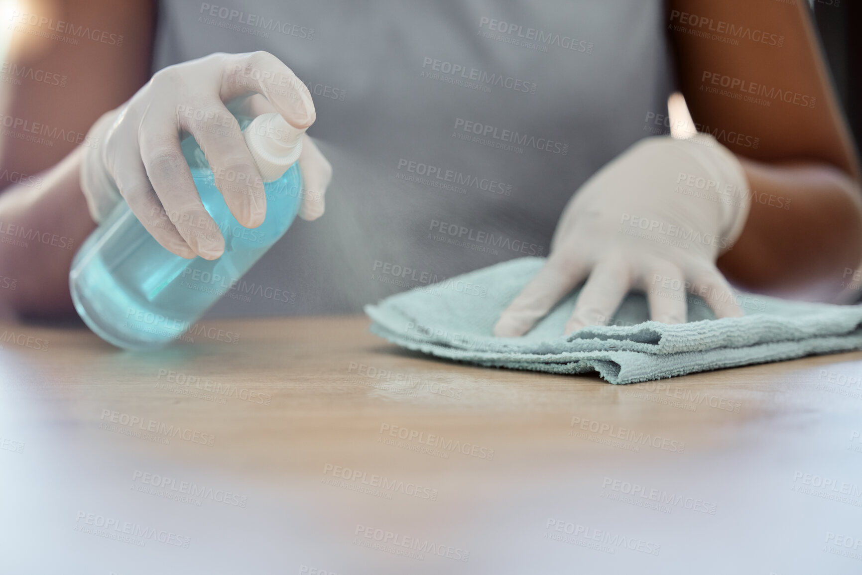 Buy stock photo Cleaning, table and woman with spray bottle, cloth and dusting furniture in home. Closeup hands of cleaner, housekeeper and maid, surface disinfection and liquid detergent product for bacteria safety