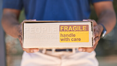 Buy stock photo Hands, logistics and box for special delivery, cargo or handle with care sign for shipping. Hand in deliver holding fragile cardboard box packaging for online purchase, export or courier service