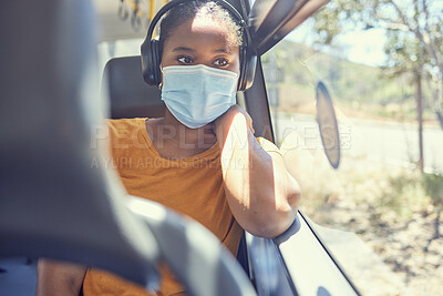 Buy stock photo Black woman, covid or headphones in bus, public transport or commute in healthcare, bacteria virus or wellness compliance. Thinking, travel passenger or student face mask and listening to radio music